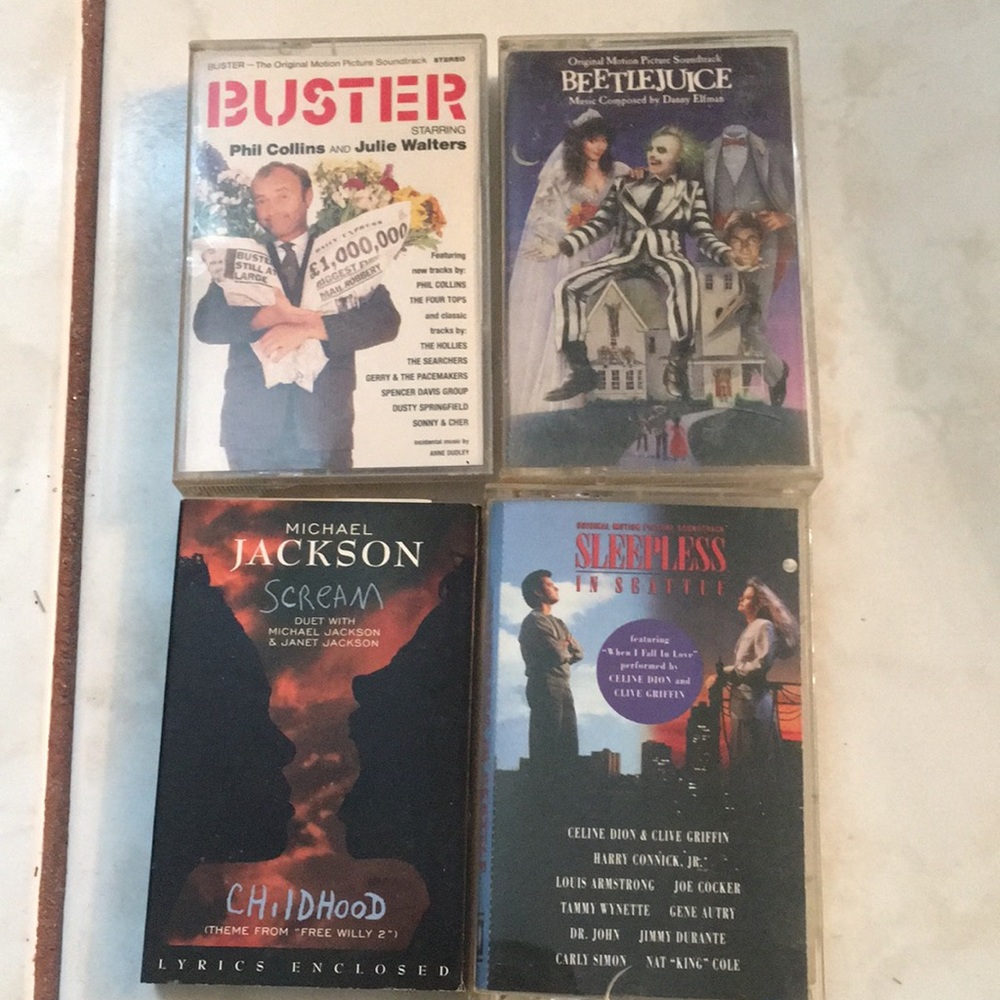 Four motion picture soundtracks on cassettes